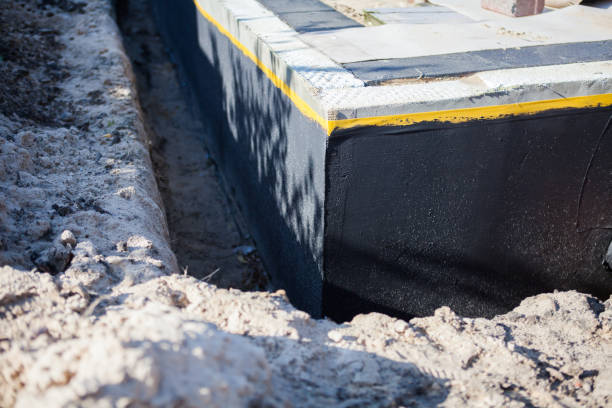 Professional Emergency Waterproofing technician working in Arlington Heights, IL